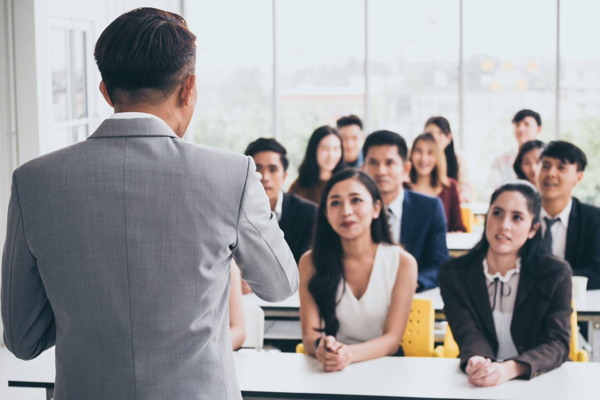 Businessman is explaining works to officers while training together at the office.